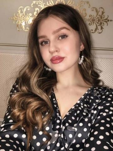 Тая